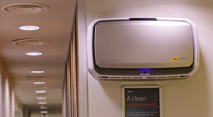 phs AERAMAX air purifier mounted in a corridor
